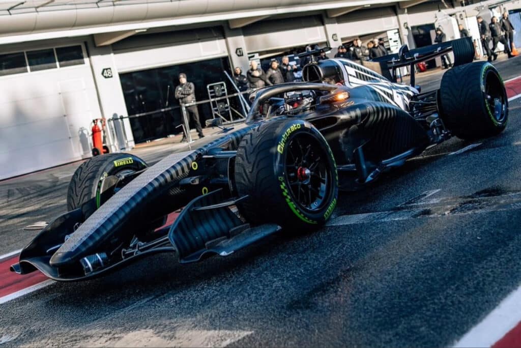 Valtteri Bottas driving the Cadillac F1 car featuring its monochrome geometric shakedown livery at Barcelona.