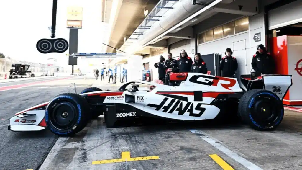 The 2026 Haas VF-26 car with Toyota Gazoo Racing branding and a white and red livery during testing.