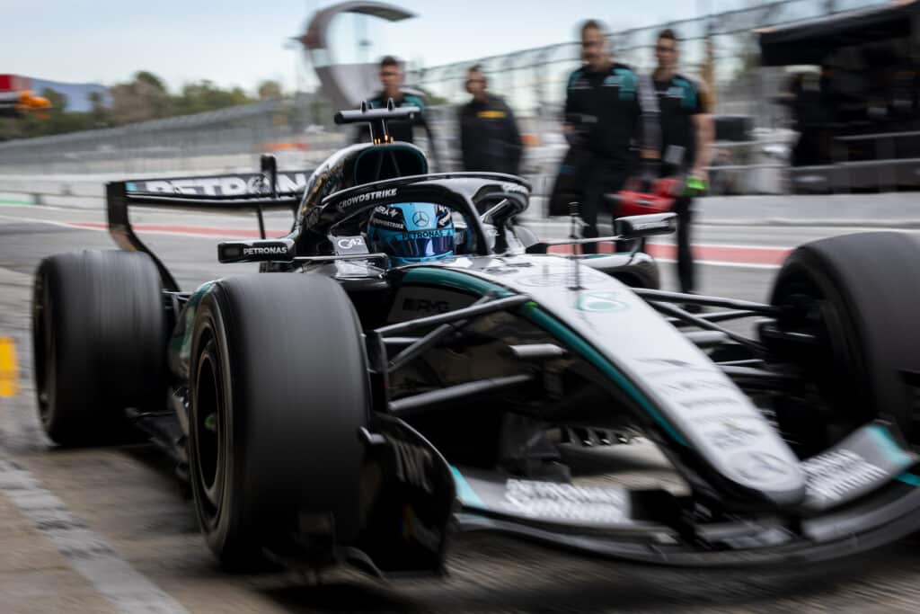 George Russell driving the Mercedes AMG F1 car out of the pit lane during Day 4 of the Barcelona shakedown test.