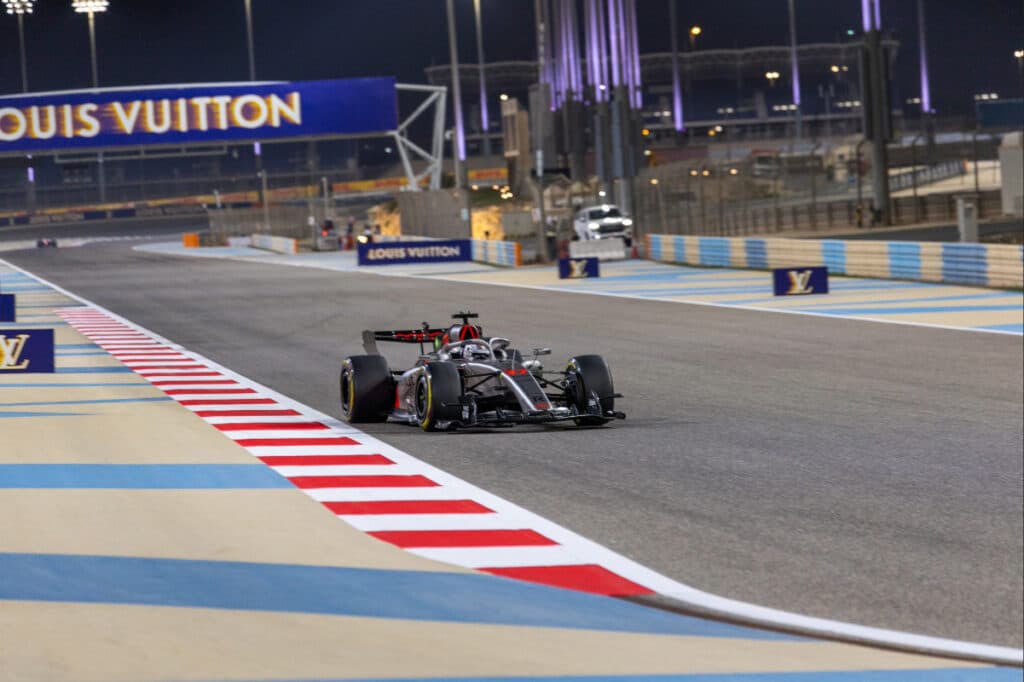 The 2026 Audi F1 car on track at night, illustrating its established position in the midfield hierarchy.