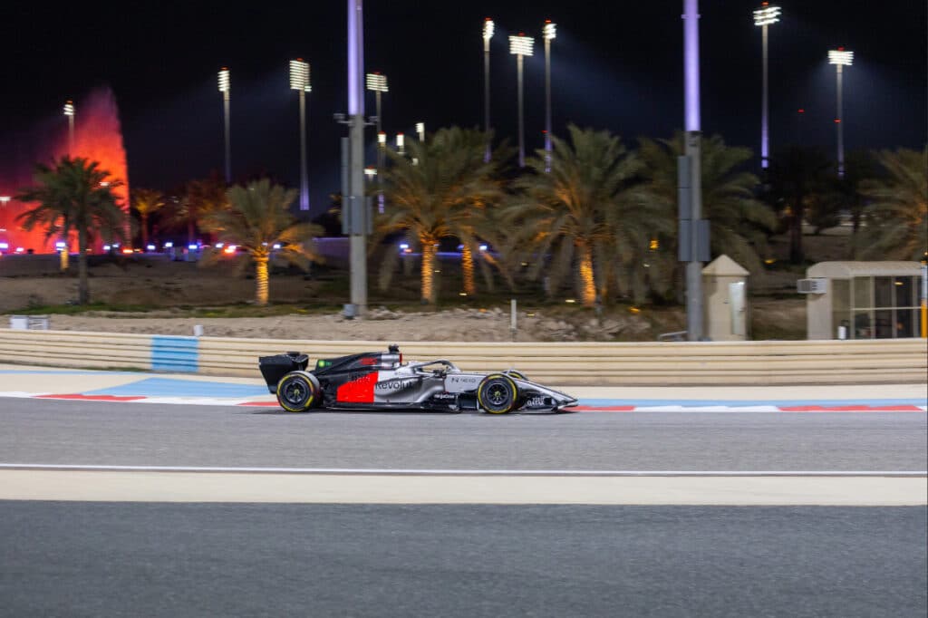 The 2026 Audi Revolut F1 car on track during pre-season testing at the Bahrain International Circuit.