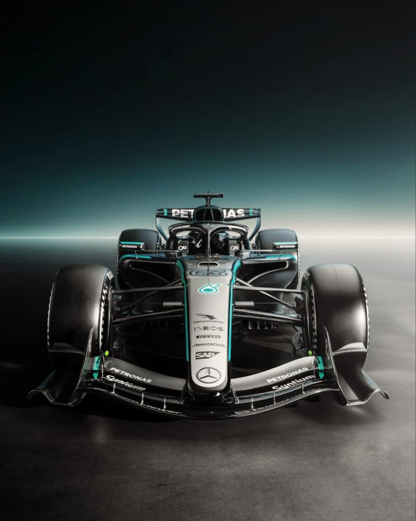 A front-facing studio shot of the Mercedes-AMG Petronas F1 car, highlighting the sleek design and engineering prestige of the silver arrows.