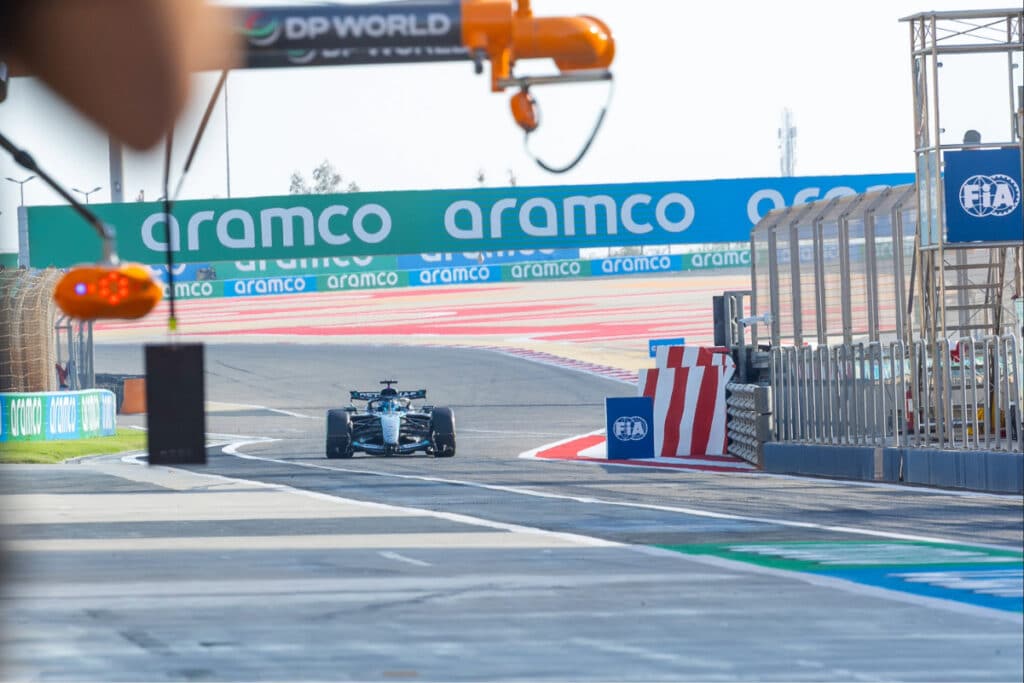 The 2026 Mercedes Formula 1 car driving toward the camera on the Bahrain International Circuit during the final day of pre-season testing.