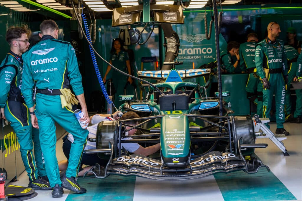 Aston Martin Aramco Formula One Team mechanics working on the AMR26 car in the garage during the Chinese Grand Prix weekend.