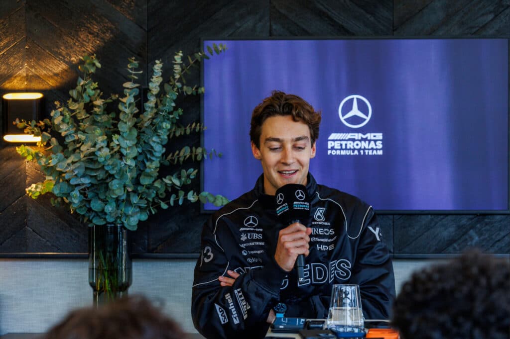 Mercedes driver George Russell speaking during a media session at the 2026 Chinese Grand Prix, discussing the team's adaptation to the new technical regulations.