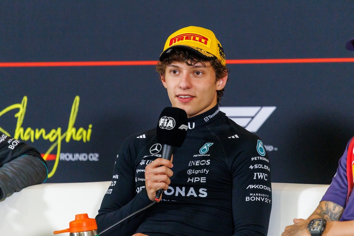 Kimi Antonelli speaking at the FIA press conference after winning the 2026 Chinese Grand Prix, marking a historic maiden victory for the Mercedes driver.