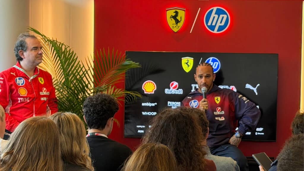 Lewis Hamilton speaking at a Ferrari media session during the 2026 Chinese Grand Prix in Shanghai.