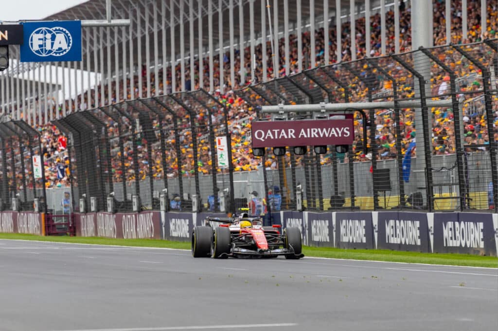 Lewis Hamilton navigates the Albert Park circuit in the Ferrari SF26 during qualifying, where he secured fourth on the grid.