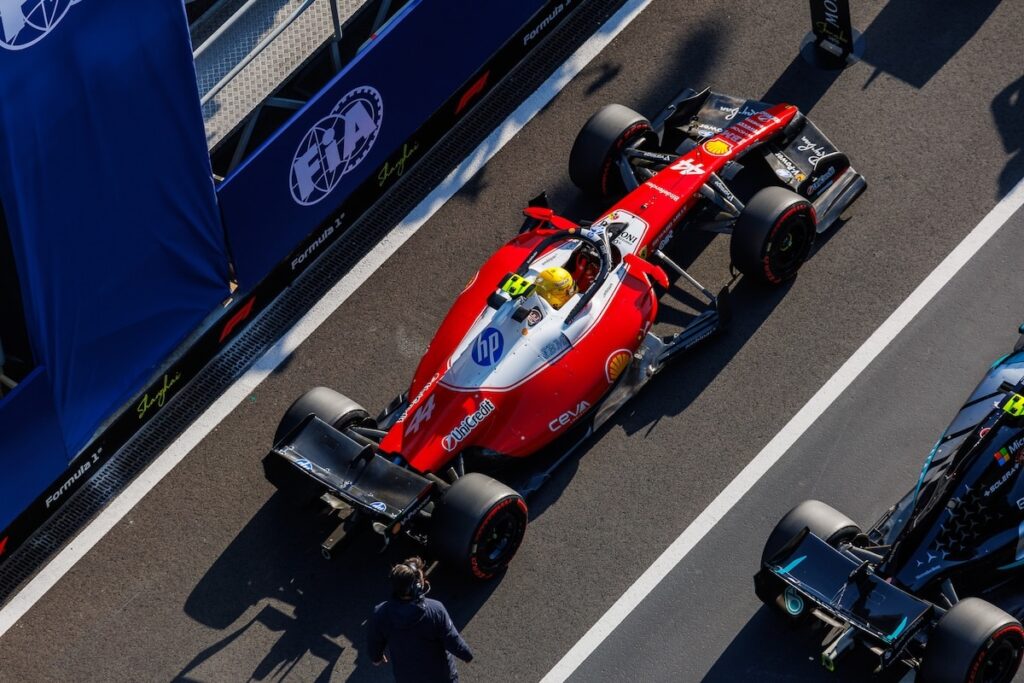 Lewis Hamilton in the Ferrari SF-26 parked in the pit lane at the Shanghai International Circuit after securing third place on the grid.