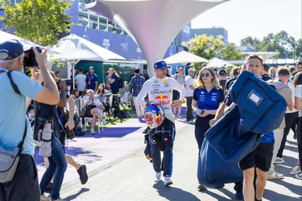 Max Verstappen walking through the Albert Park paddock during the 2026 Australian Grand Prix weekend.