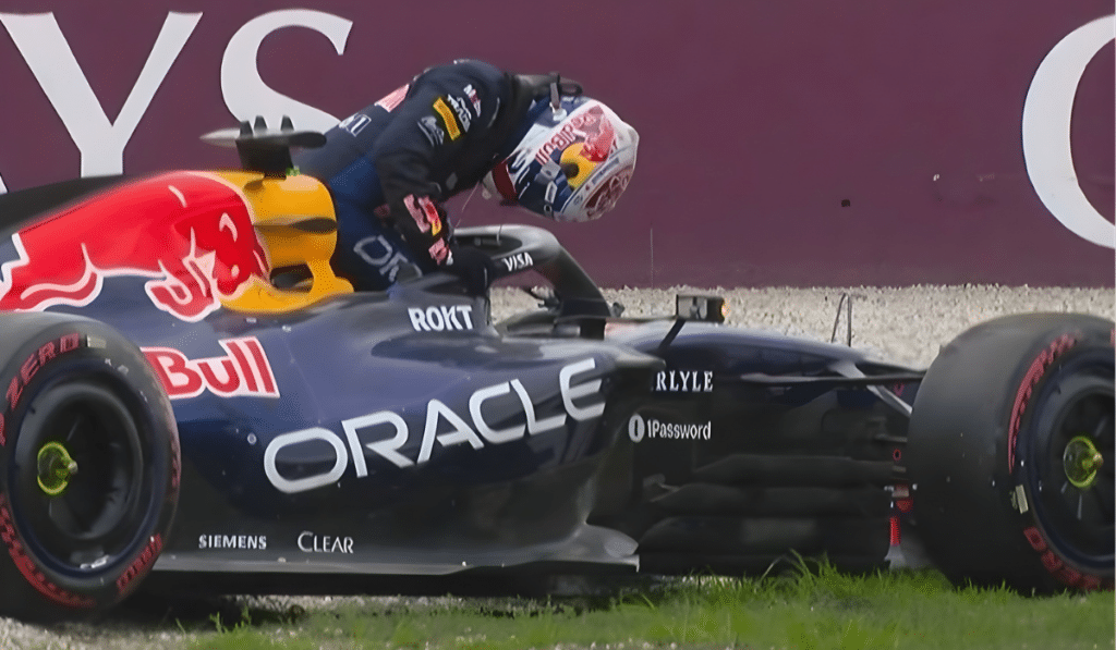 Max Verstappen inspects his Red Bull RB22 after crashing out during qualifying at the 2026 Australian Grand Prix.